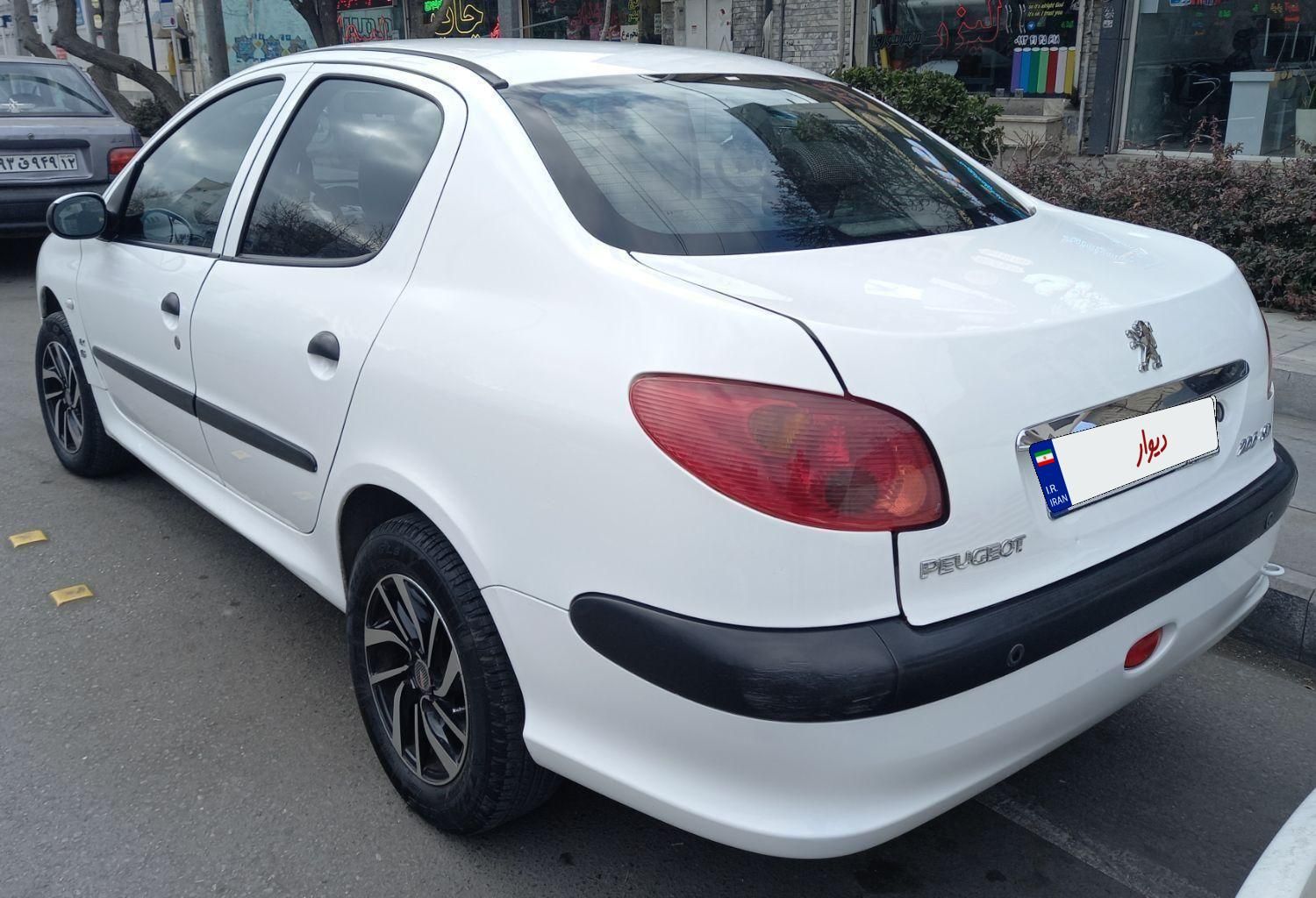پژو ۲۰۶ صندوق دار v8 - 1396