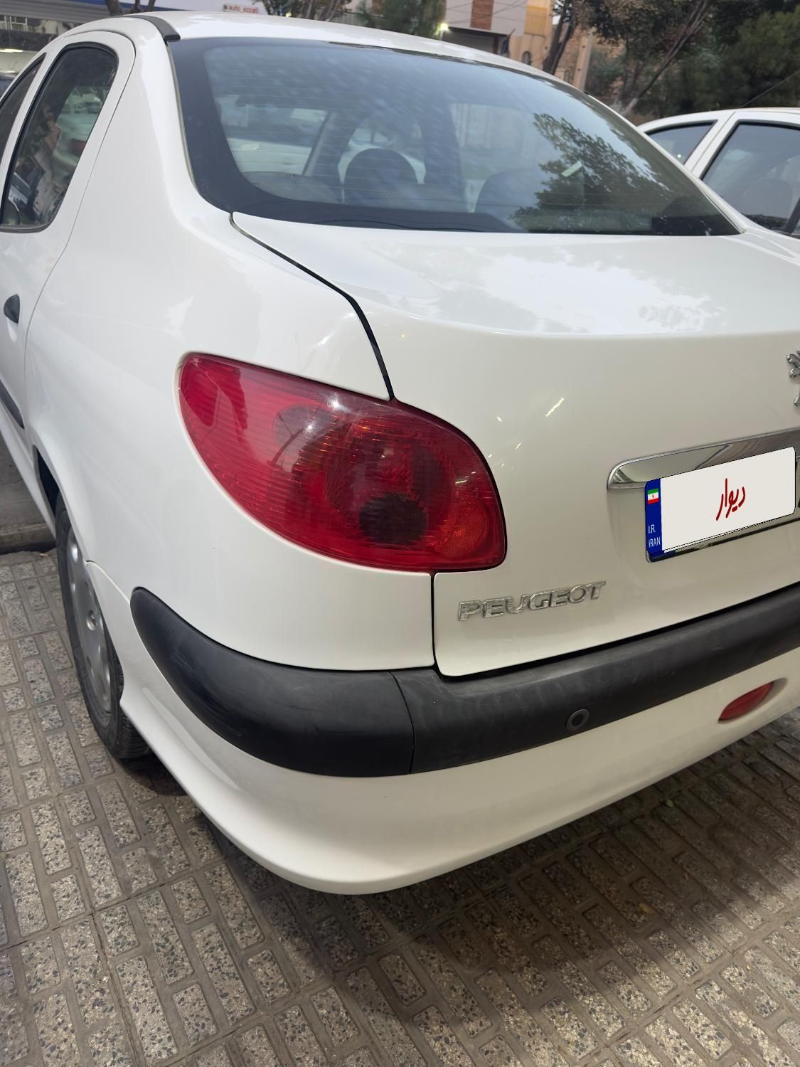 پژو ۲۰۶ صندوق دار v8 - 1396