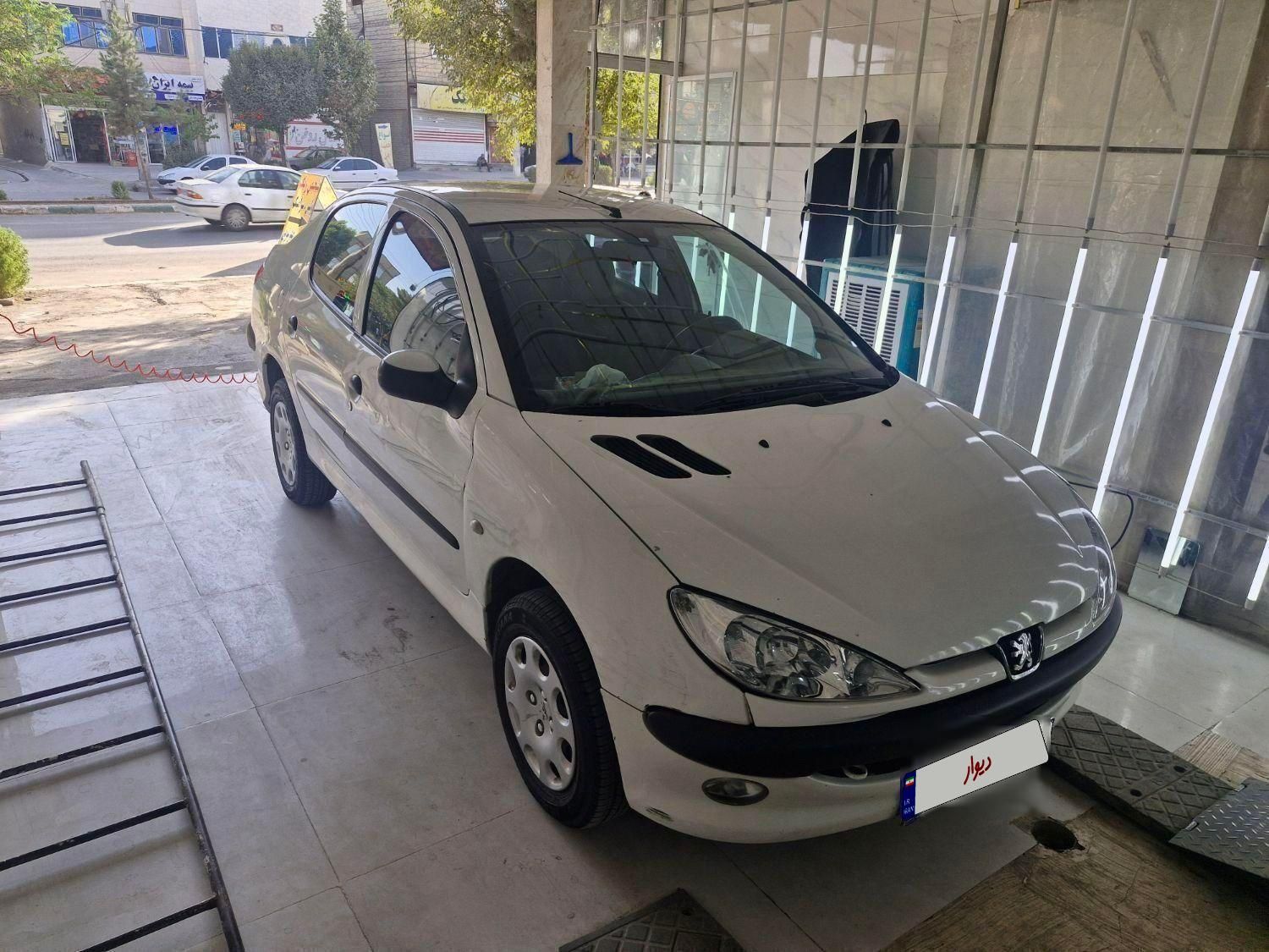 پژو ۲۰۶ صندوق دار v8 - 1395