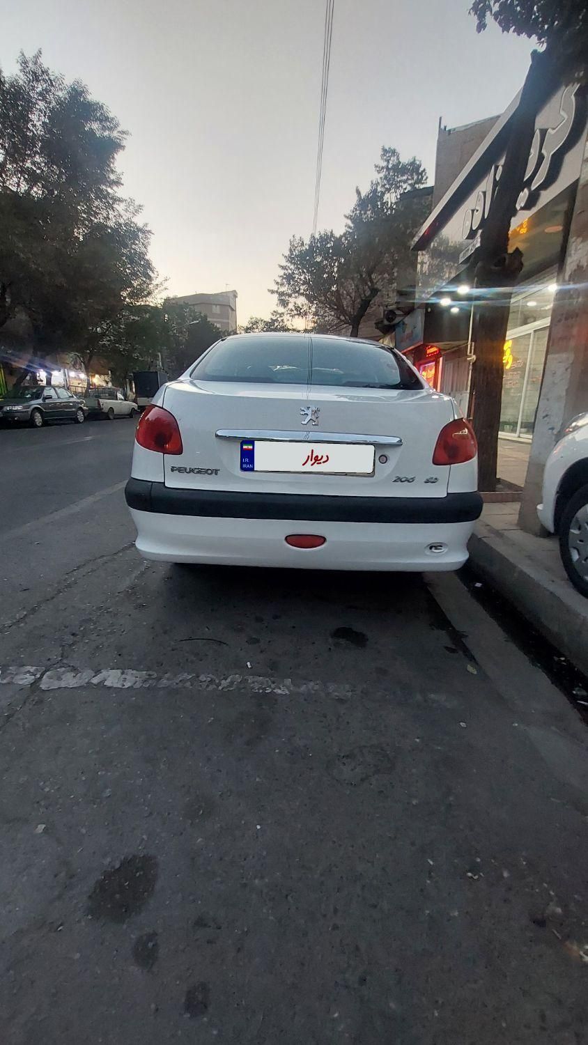 پژو ۲۰۶ صندوق دار v8 - 1395