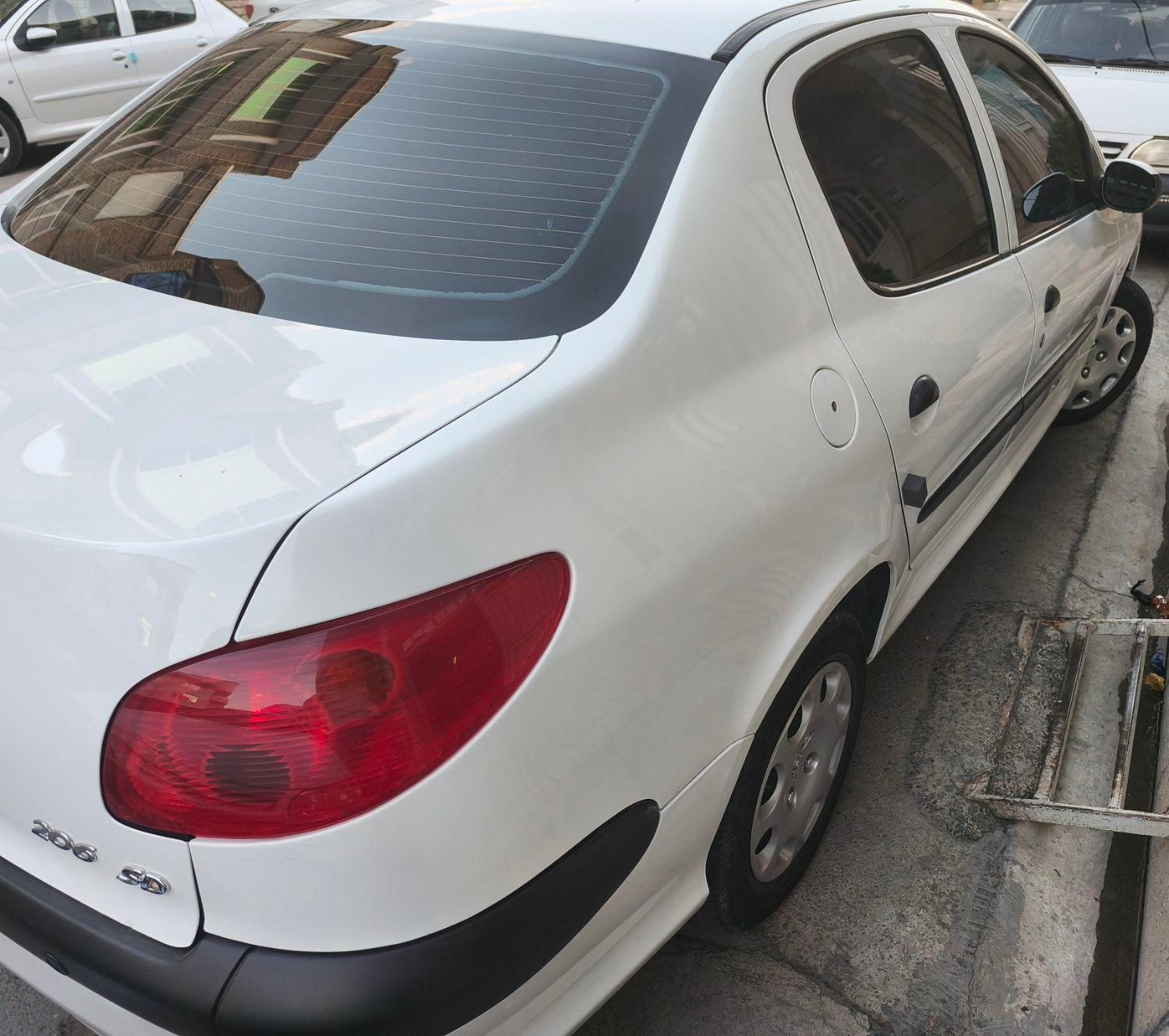 پژو ۲۰۶ صندوق دار v8 - 1394