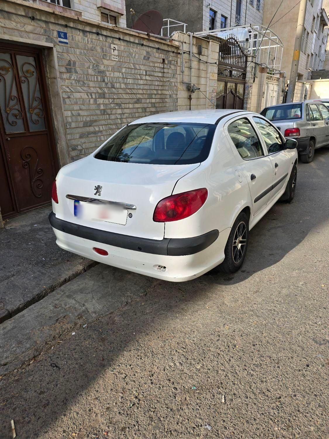 پژو ۲۰۶ صندوق دار v8 - 1394
