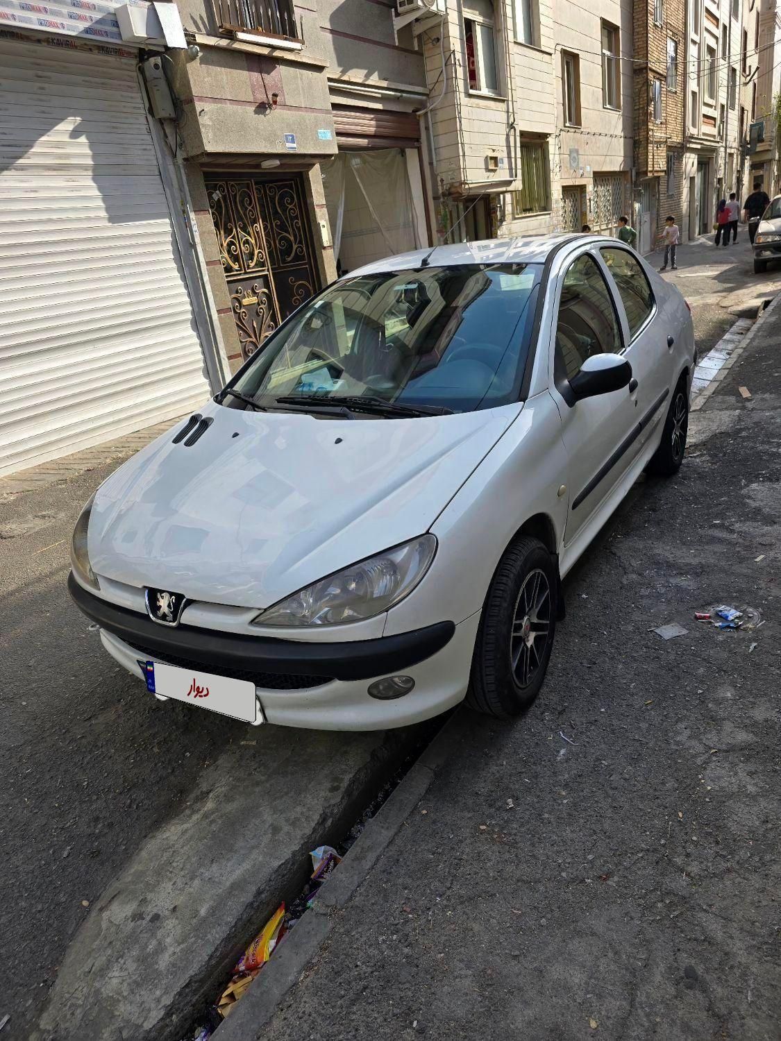 پژو ۲۰۶ صندوق دار v8 - 1394