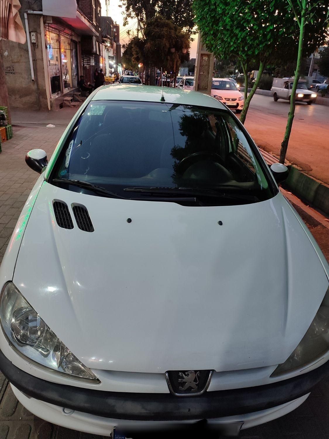 پژو ۲۰۶ صندوق دار v8 - 1395