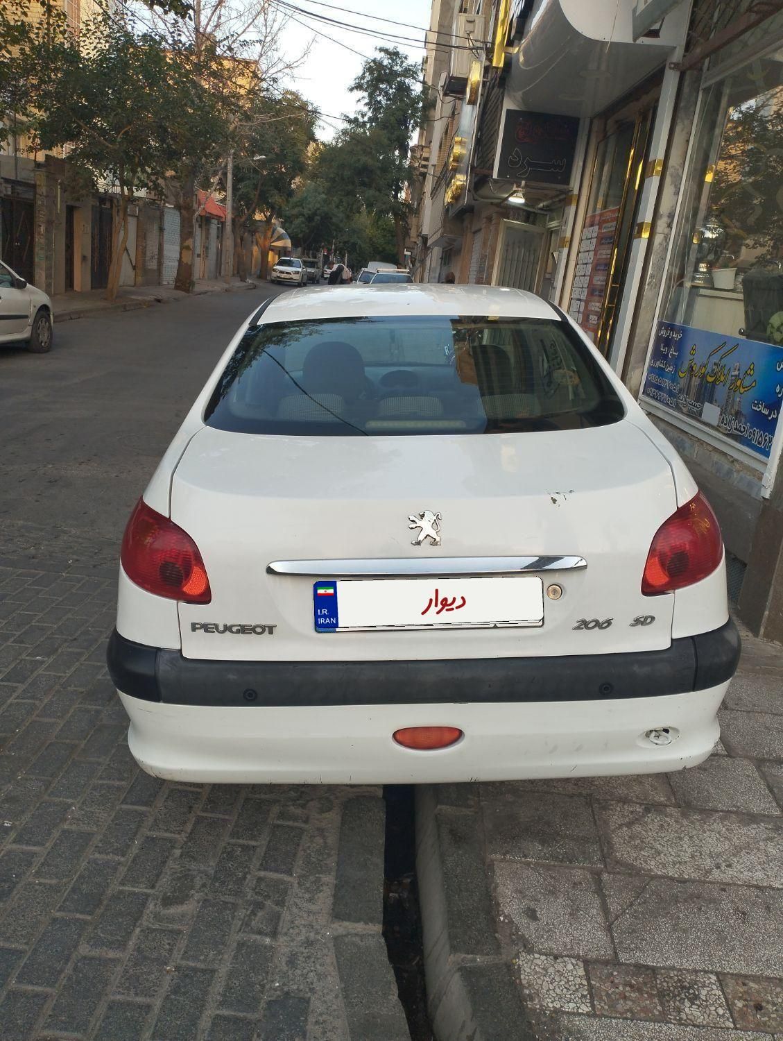 پژو ۲۰۶ صندوق دار v8 - 1395