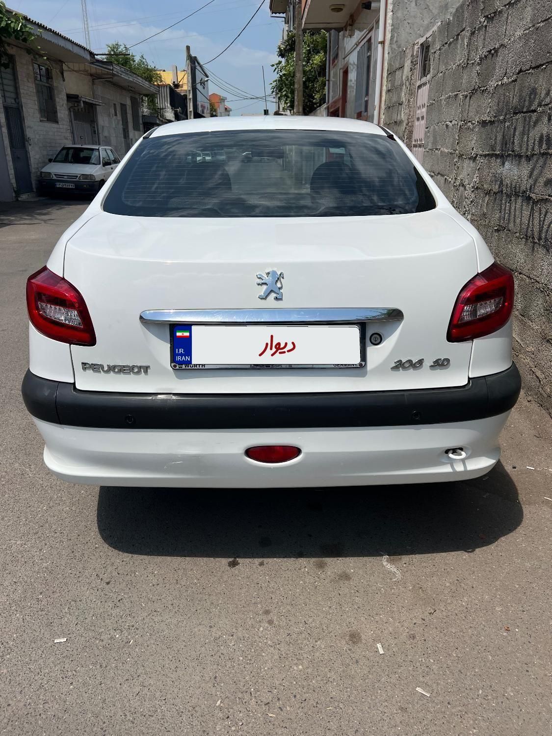 پژو ۲۰۶ صندوق دار v8 - 1396