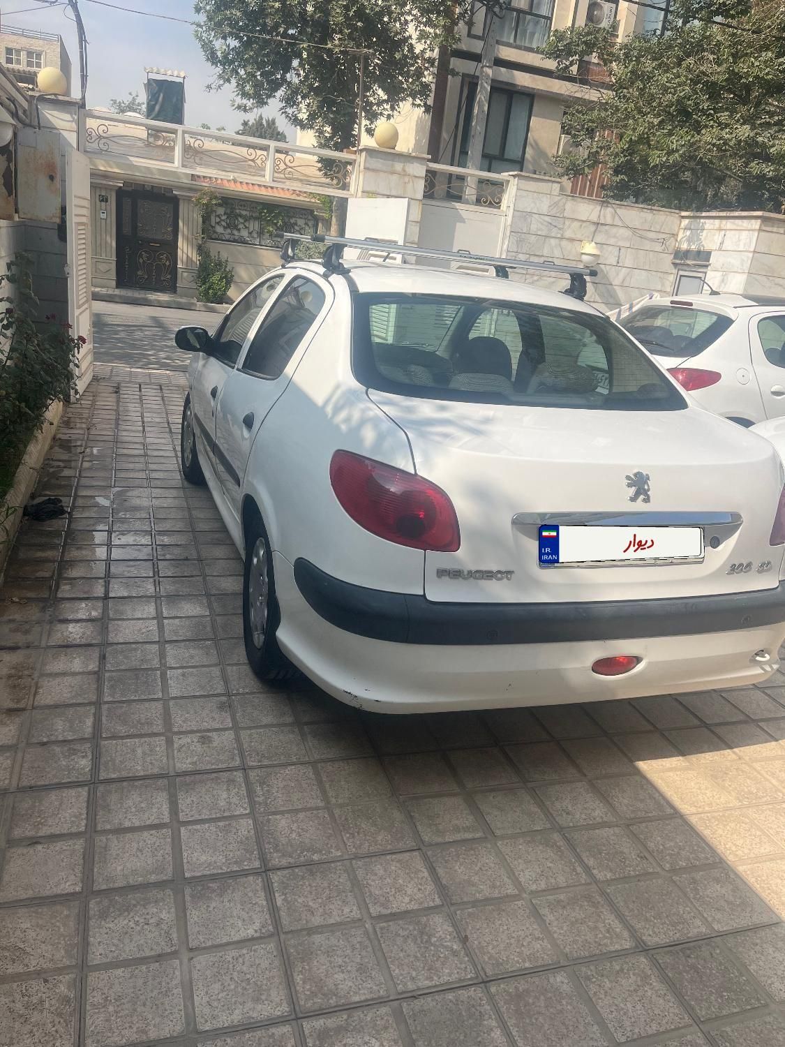 پژو ۲۰۶ صندوق دار v8 - 1397