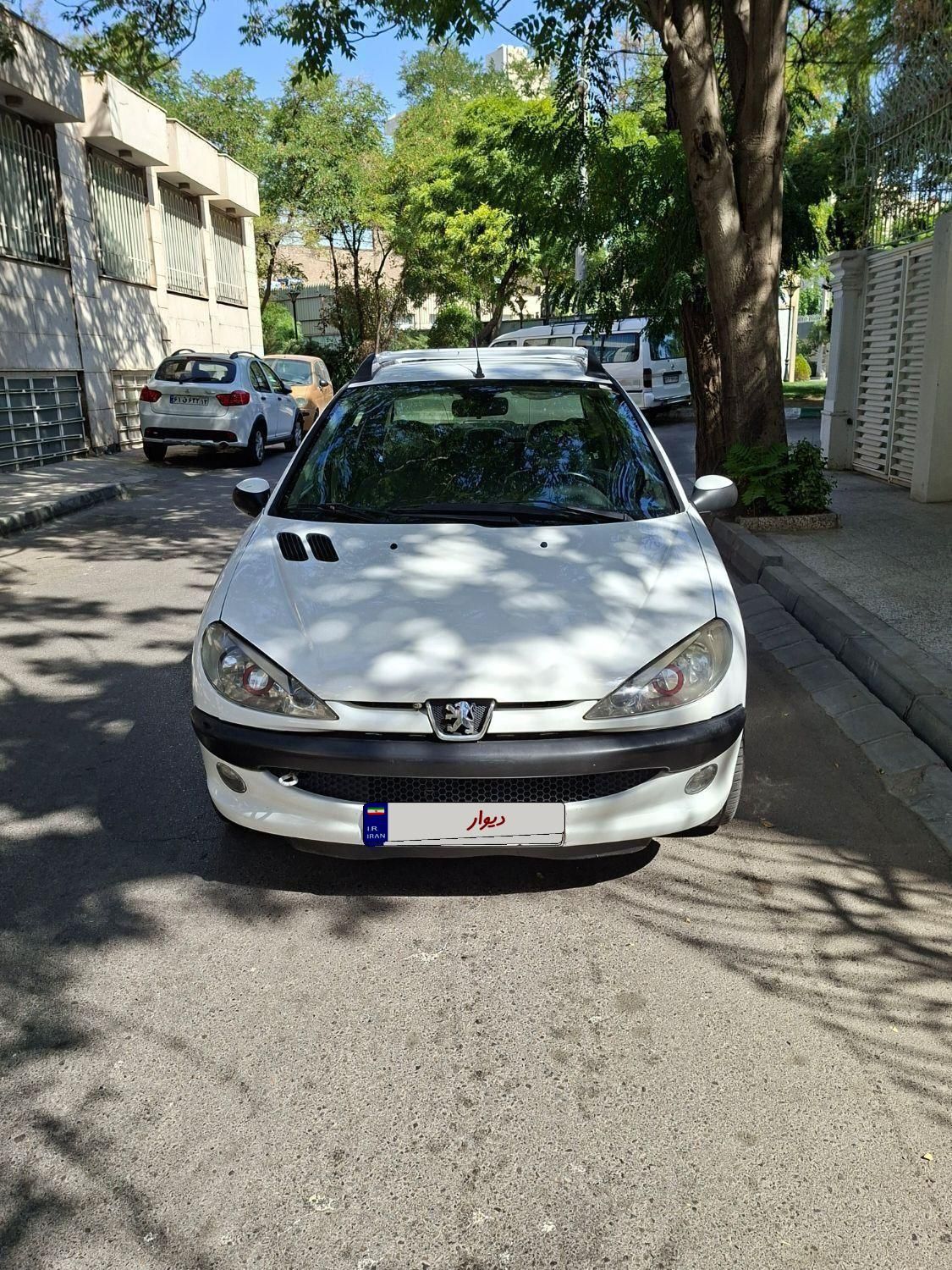 پژو ۲۰۶ صندوق دار v8 - 1395