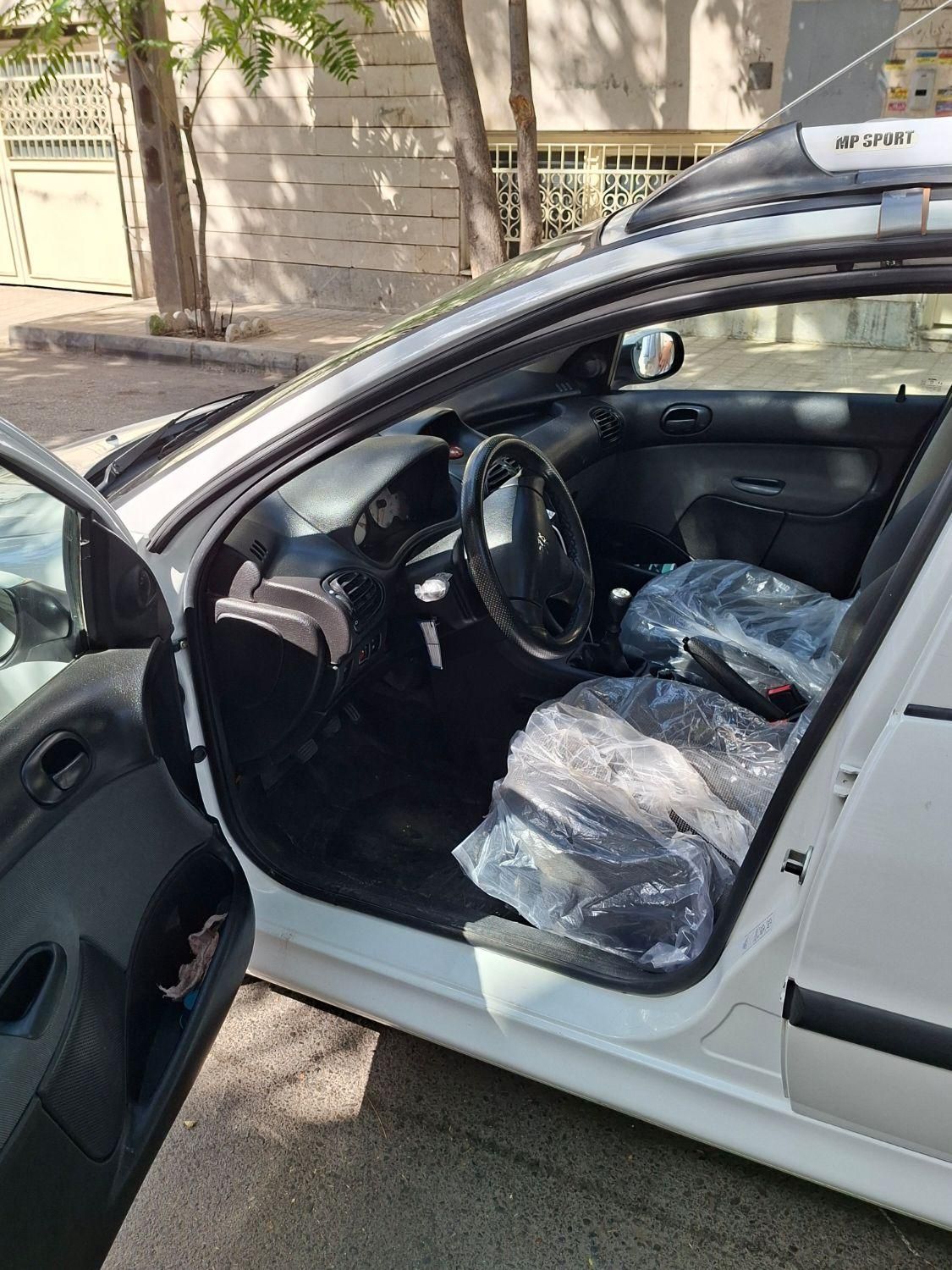 پژو ۲۰۶ صندوق دار v8 - 1395