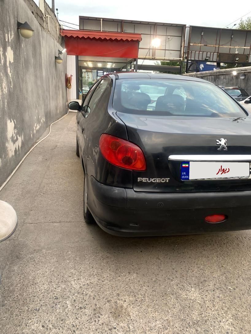 پژو ۲۰۶ صندوق دار v8 - 1394