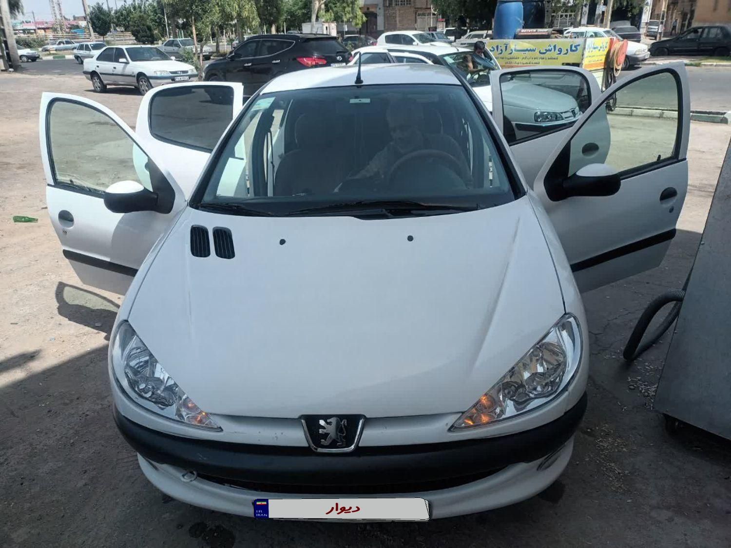 پژو ۲۰۶ صندوق دار v8 - 1391