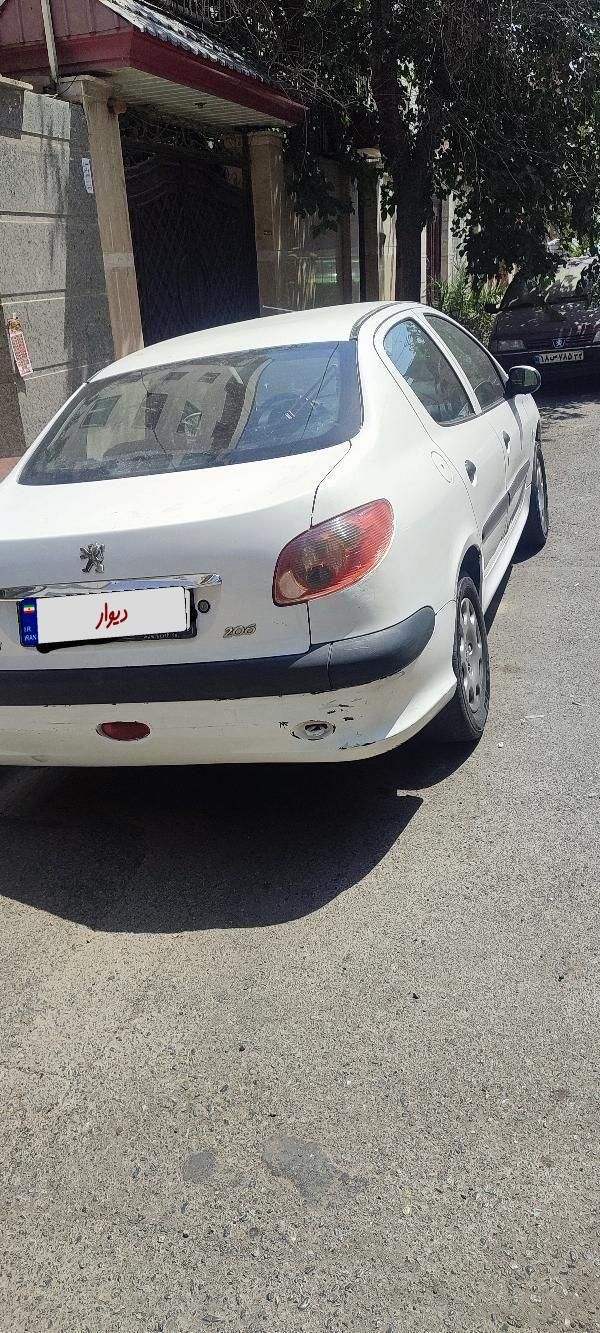 پژو ۲۰۶ صندوق دار v8 - 1390