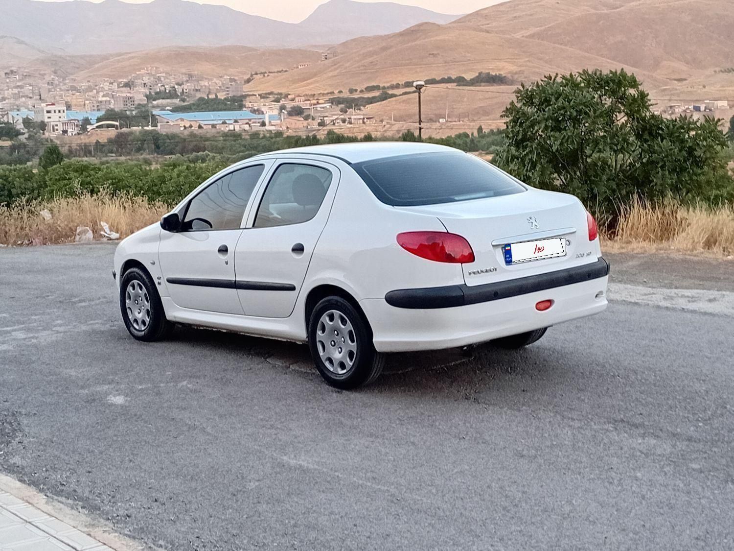 پژو ۲۰۶ صندوق دار v8 - 1395