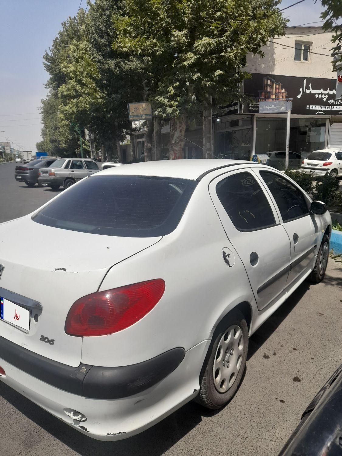 پژو ۲۰۶ صندوق دار v6 - 1390