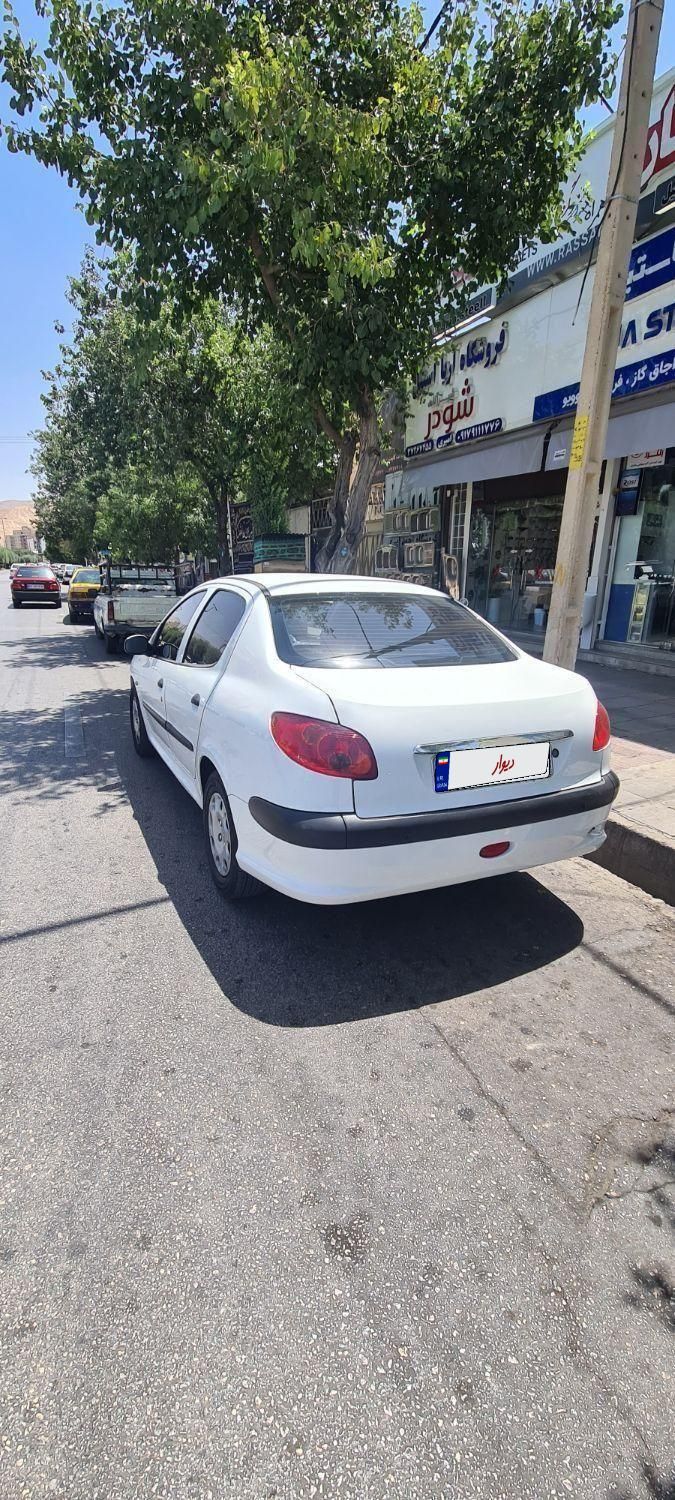 پژو ۲۰۶ صندوق دار v8 - 1394
