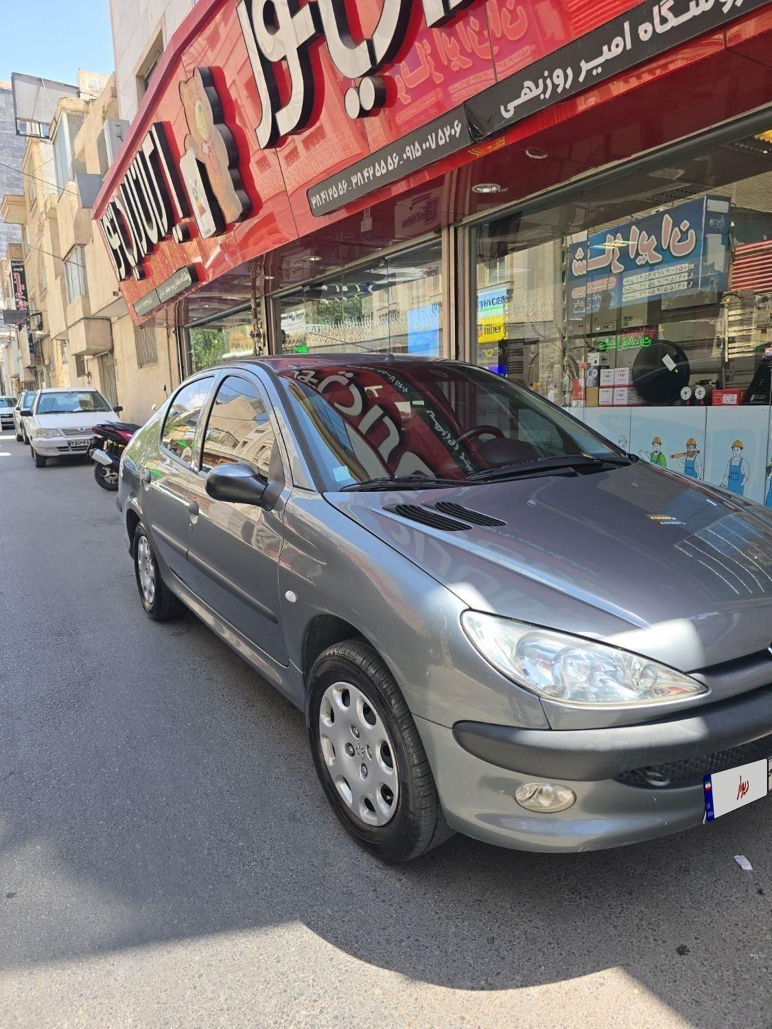 پژو ۲۰۶ صندوق دار v8 - 1397