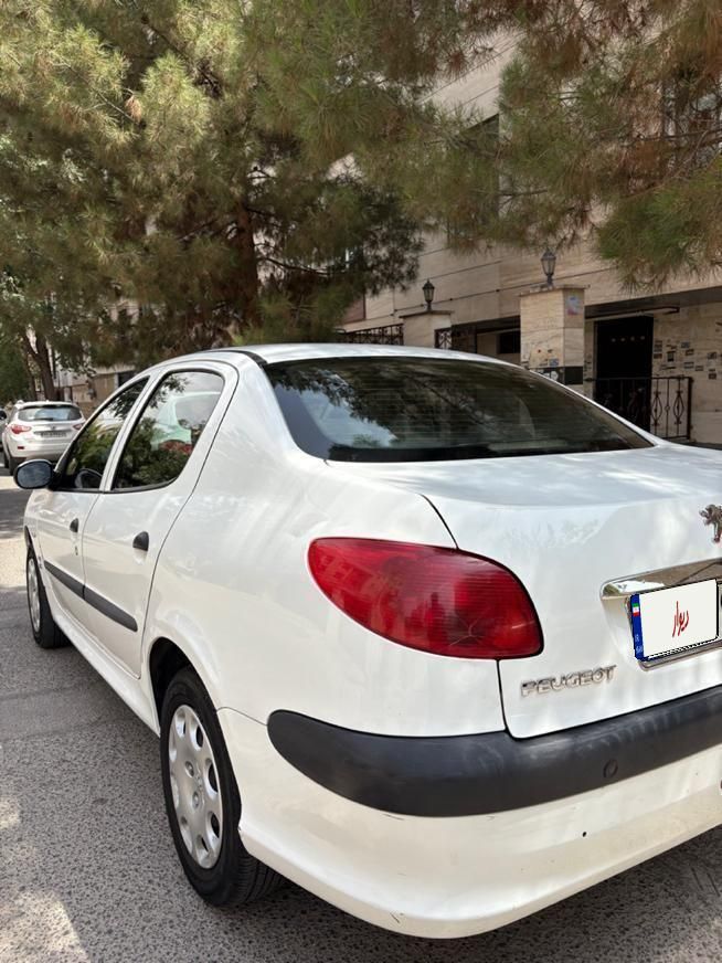 پژو ۲۰۶ صندوق دار v8 - 1396