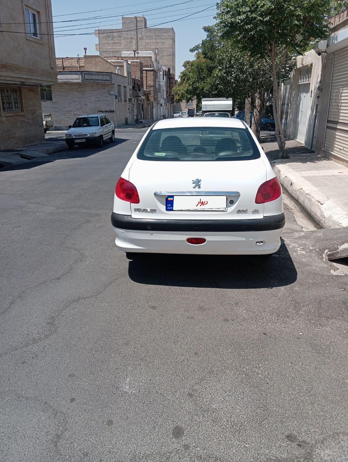 پژو ۲۰۶ صندوق دار v8 - 1396
