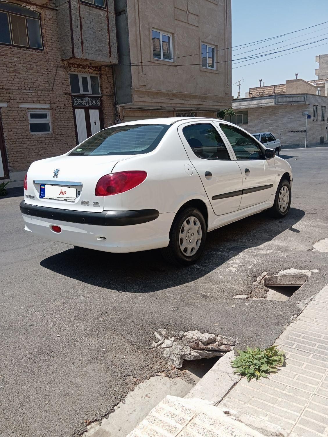 پژو ۲۰۶ صندوق دار v8 - 1396