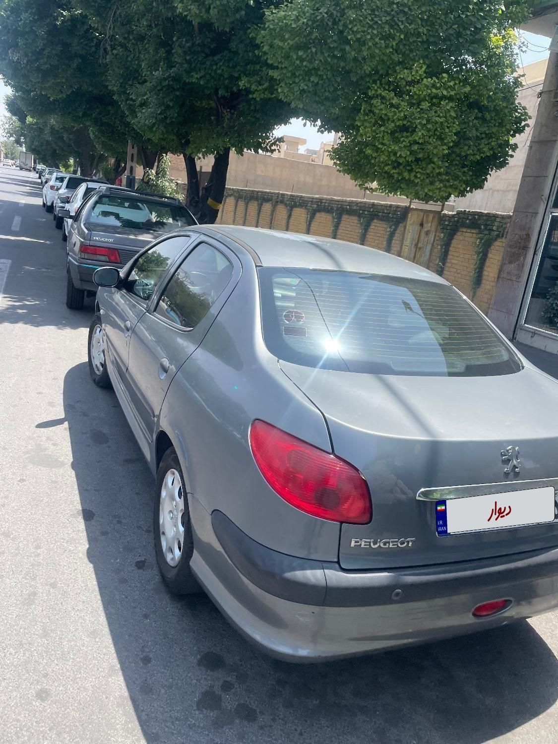 پژو ۲۰۶ صندوق دار v8 - 1396