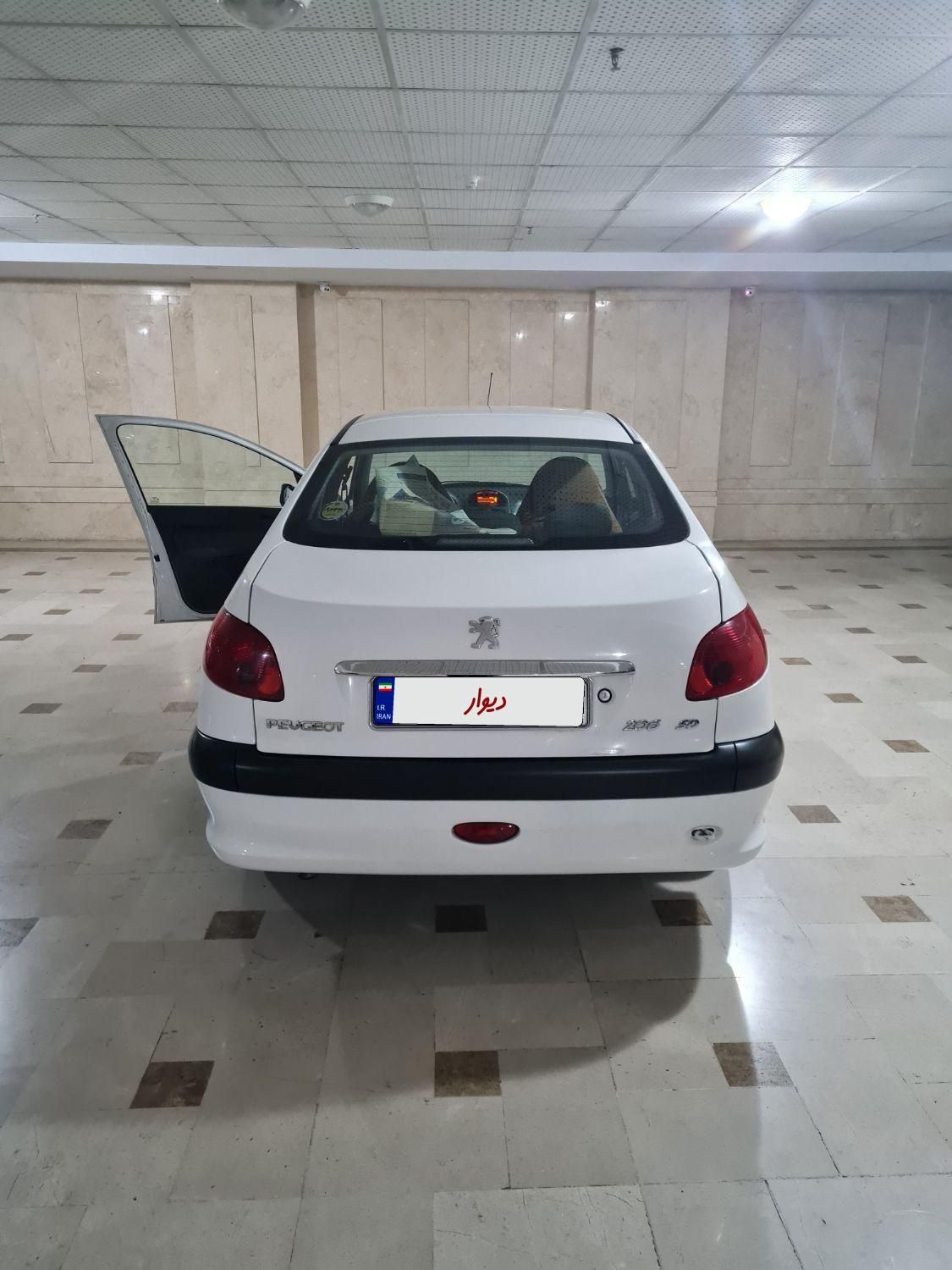 پژو ۲۰۶ صندوق دار v8 - 1398