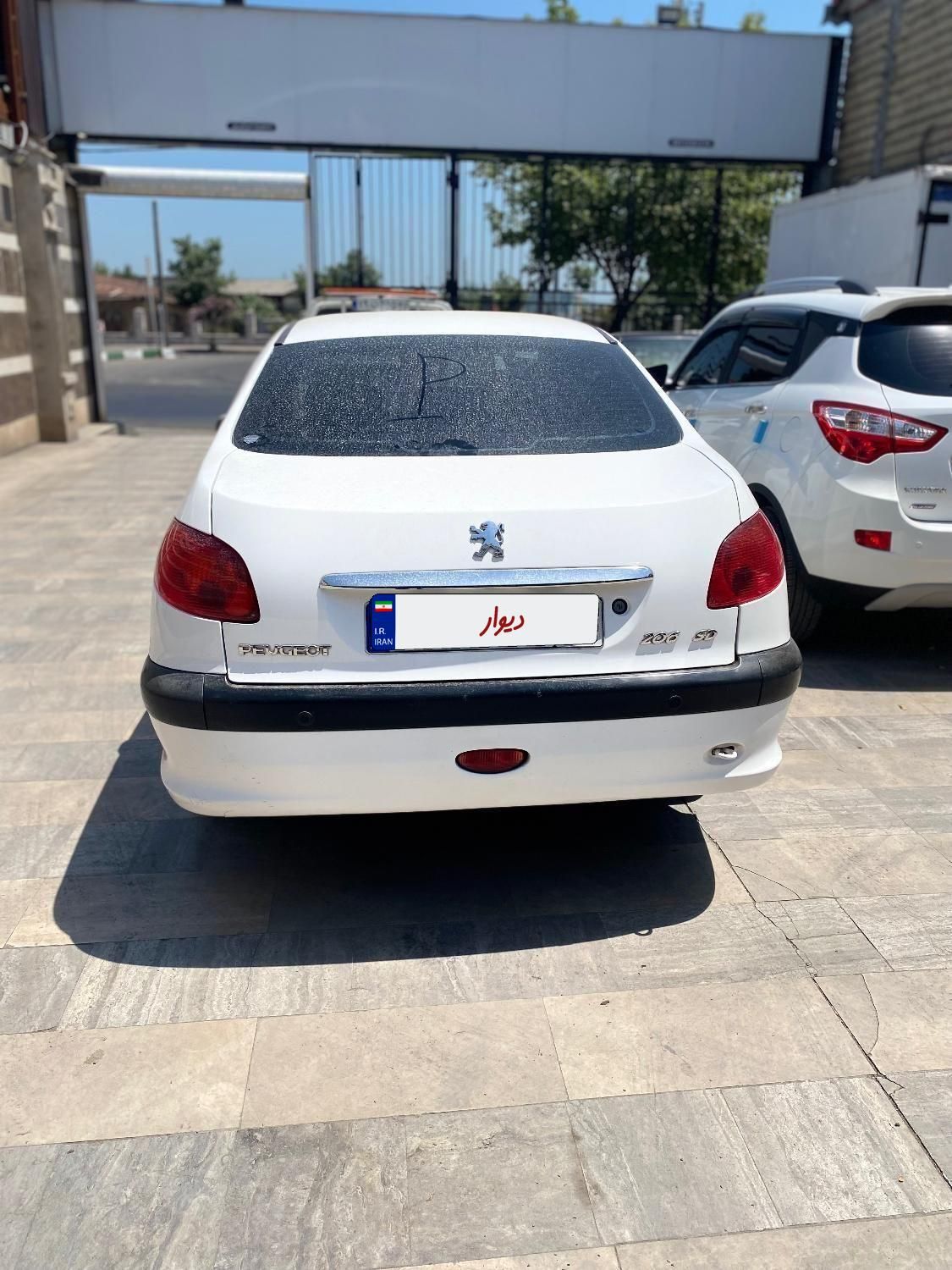 پژو ۲۰۶ صندوق دار v8 - 1398