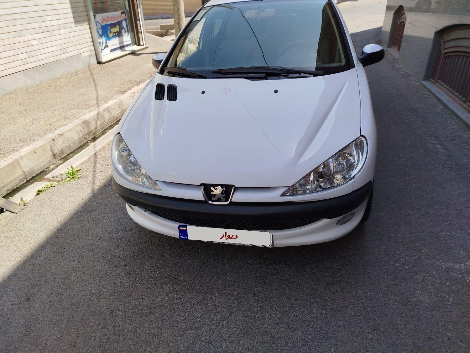 پژو ۲۰۶ صندوق دار v8 - 1394