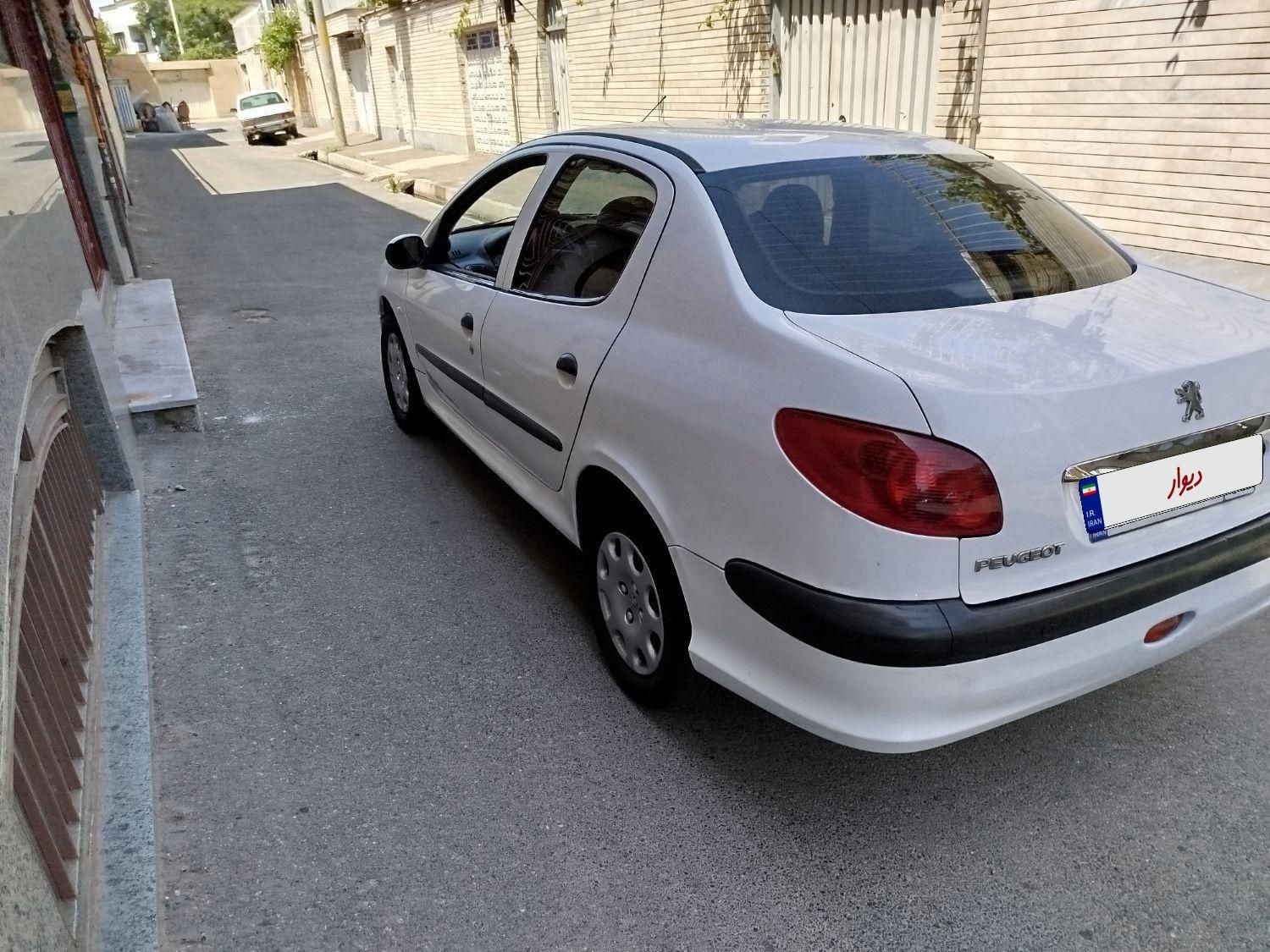 پژو ۲۰۶ صندوق دار v8 - 1394