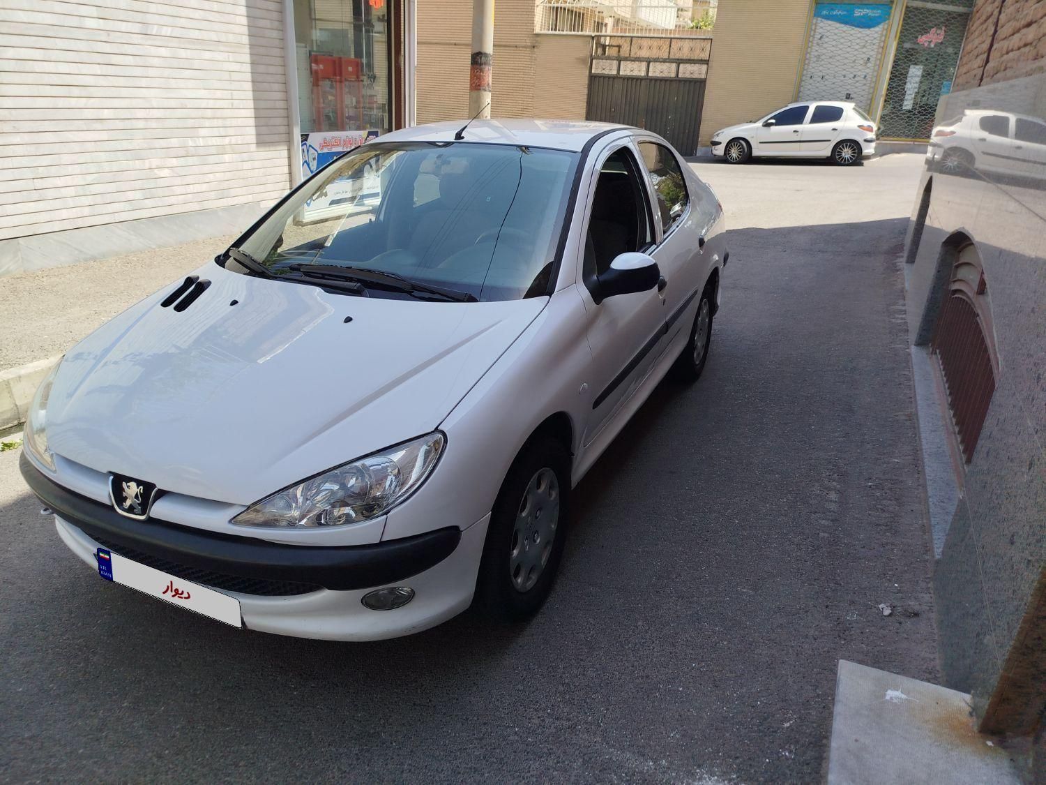 پژو ۲۰۶ صندوق دار v8 - 1394