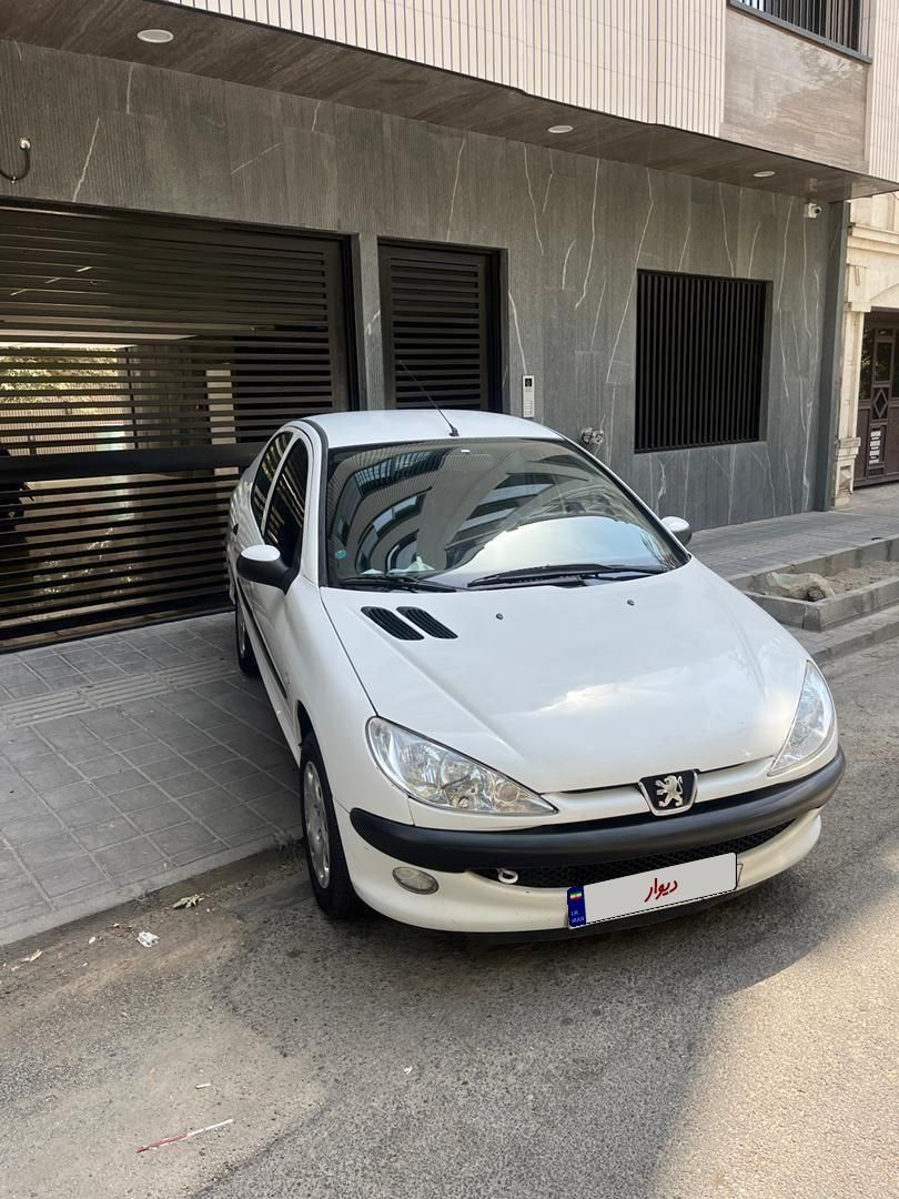 پژو ۲۰۶ صندوق دار v8 - 1396
