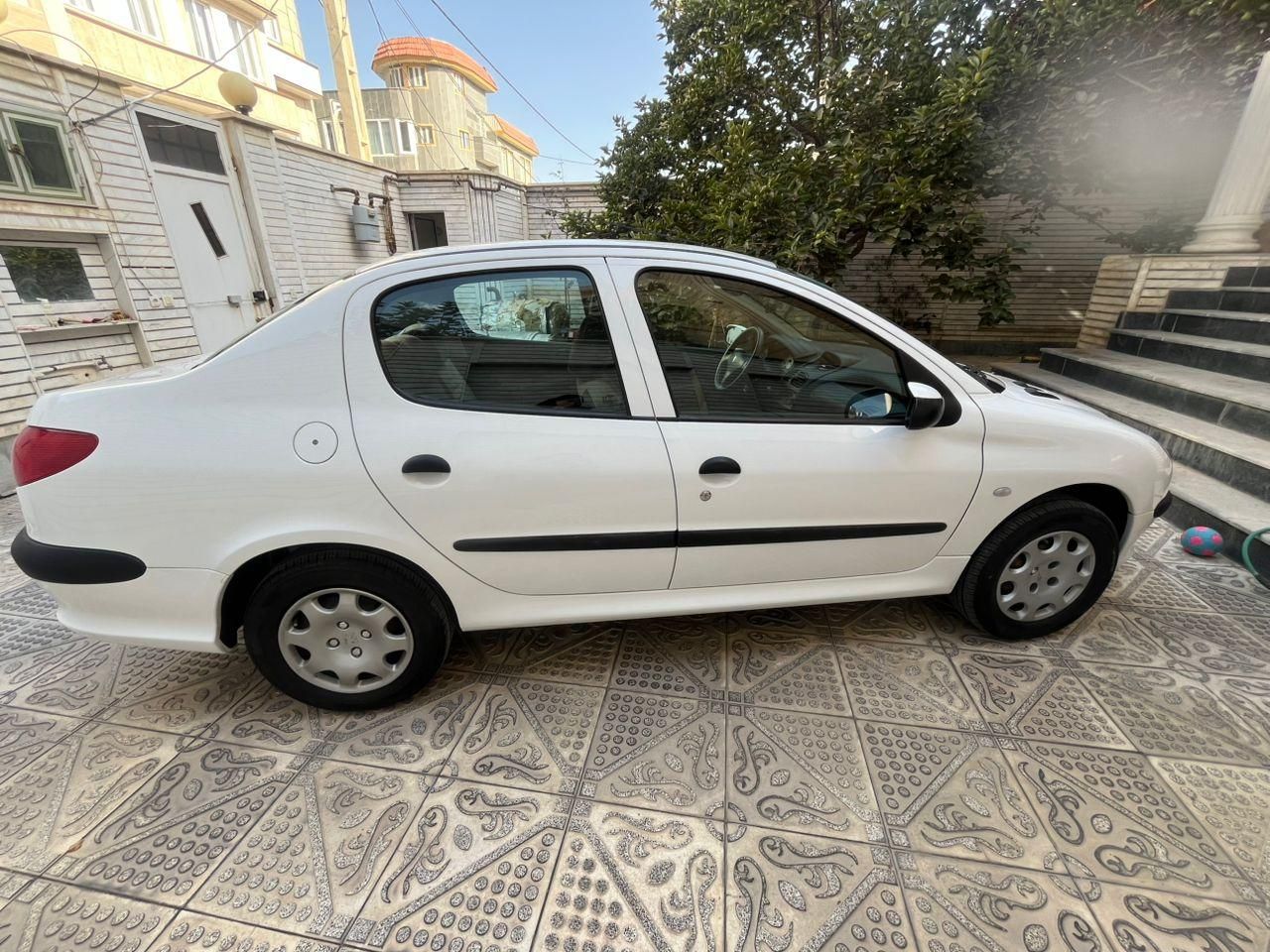 پژو ۲۰۶ صندوق دار v8 - 1396