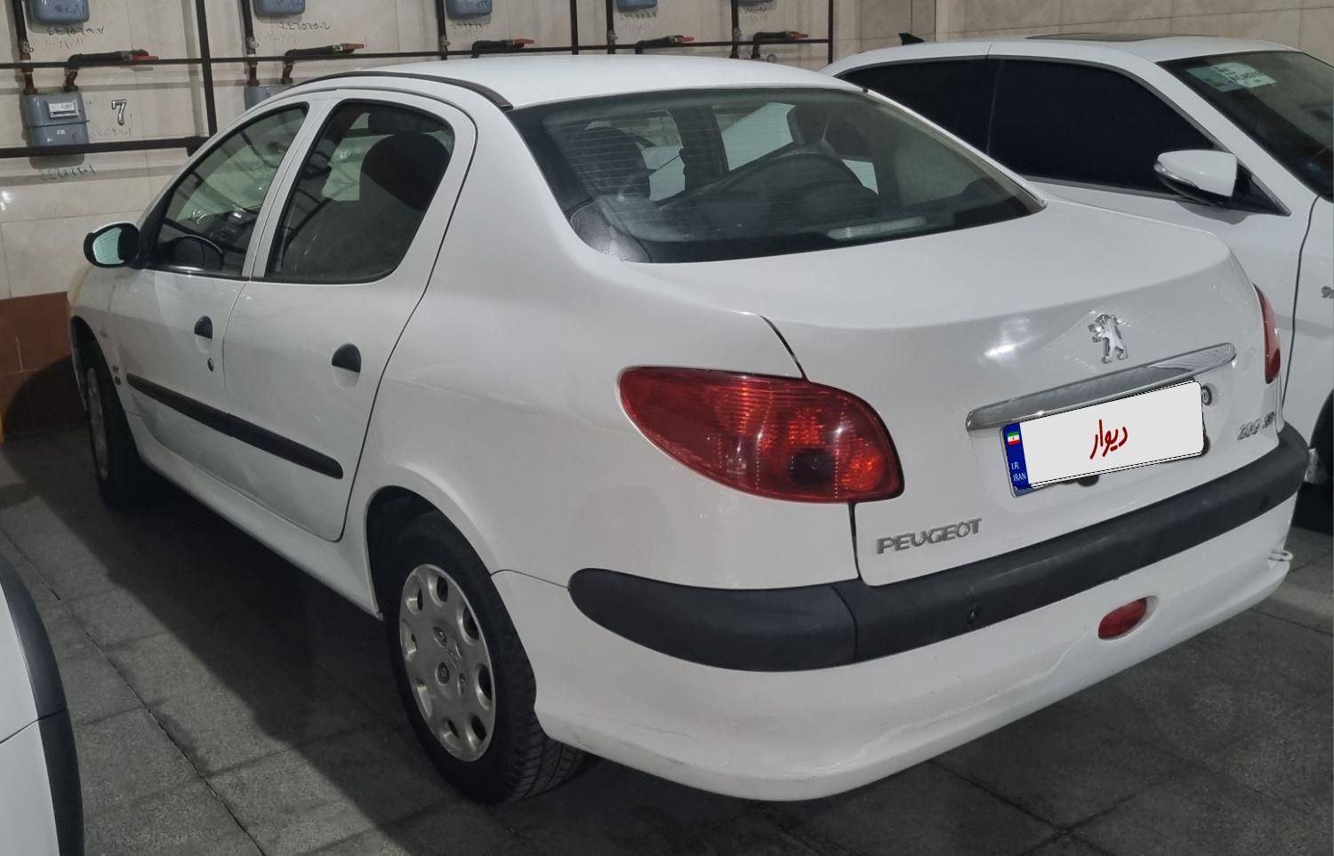 پژو ۲۰۶ صندوق دار v8 - 1394
