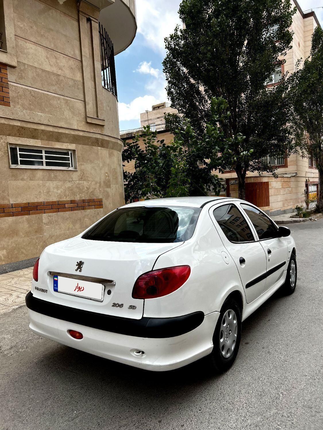 پژو ۲۰۶ صندوق دار v8 - 1393