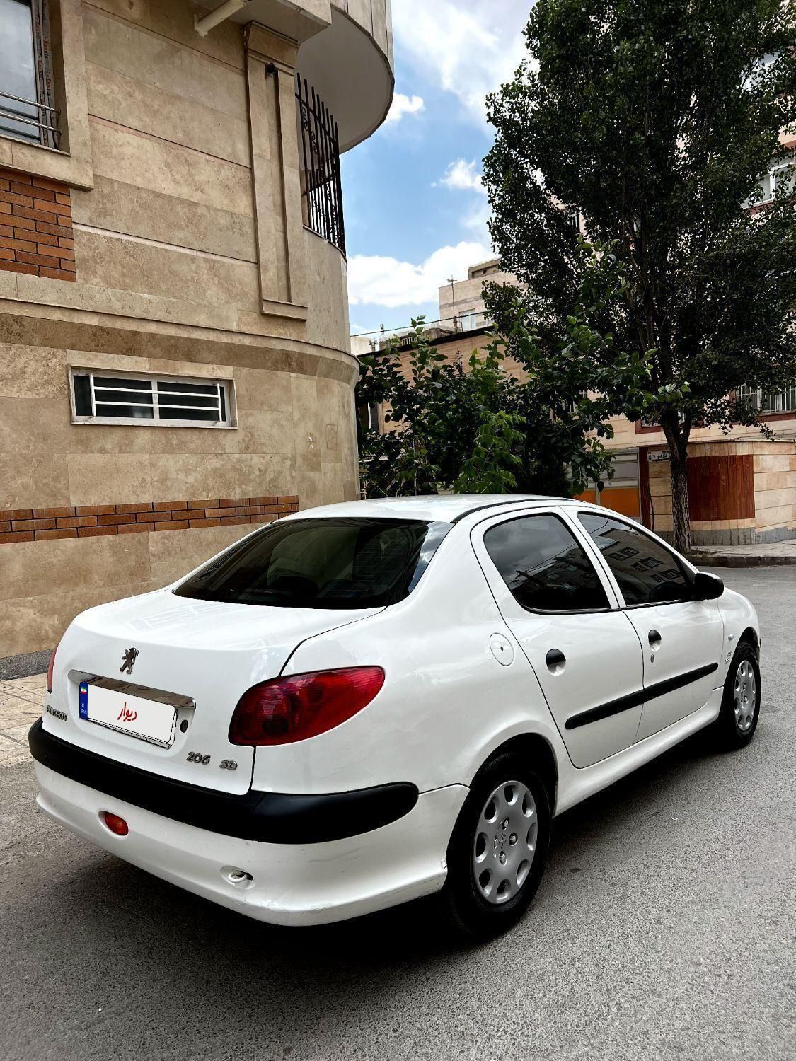 پژو ۲۰۶ صندوق دار v8 - 1393