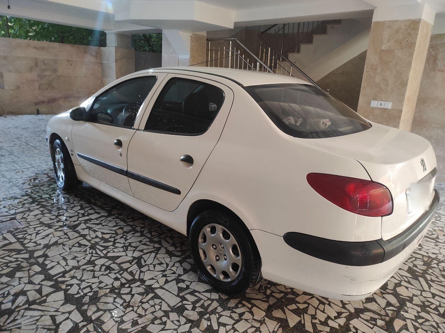 پژو ۲۰۶ صندوق دار v8 - 1396