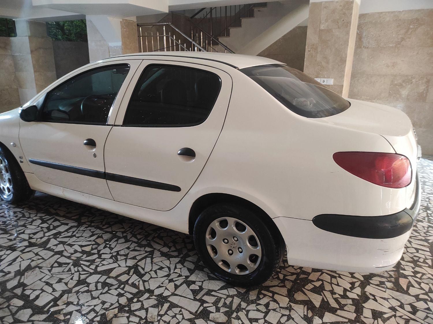 پژو ۲۰۶ صندوق دار v8 - 1396