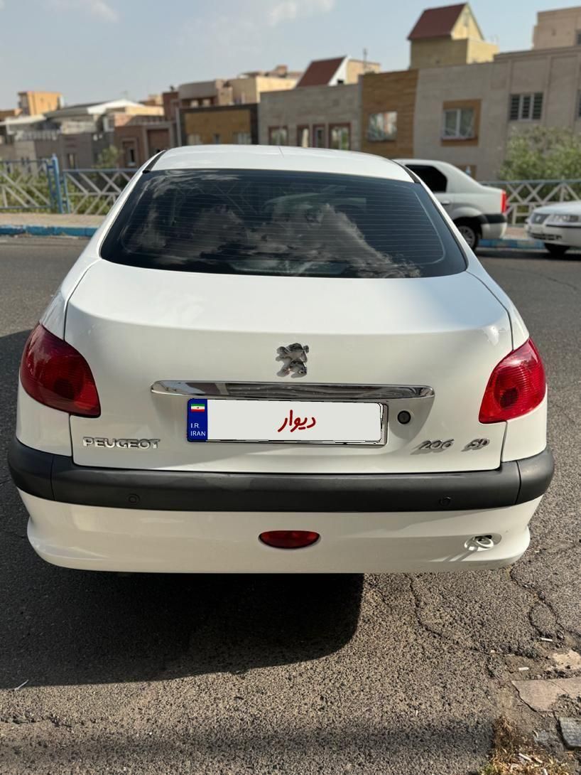 پژو ۲۰۶ صندوق دار v8 - 1394