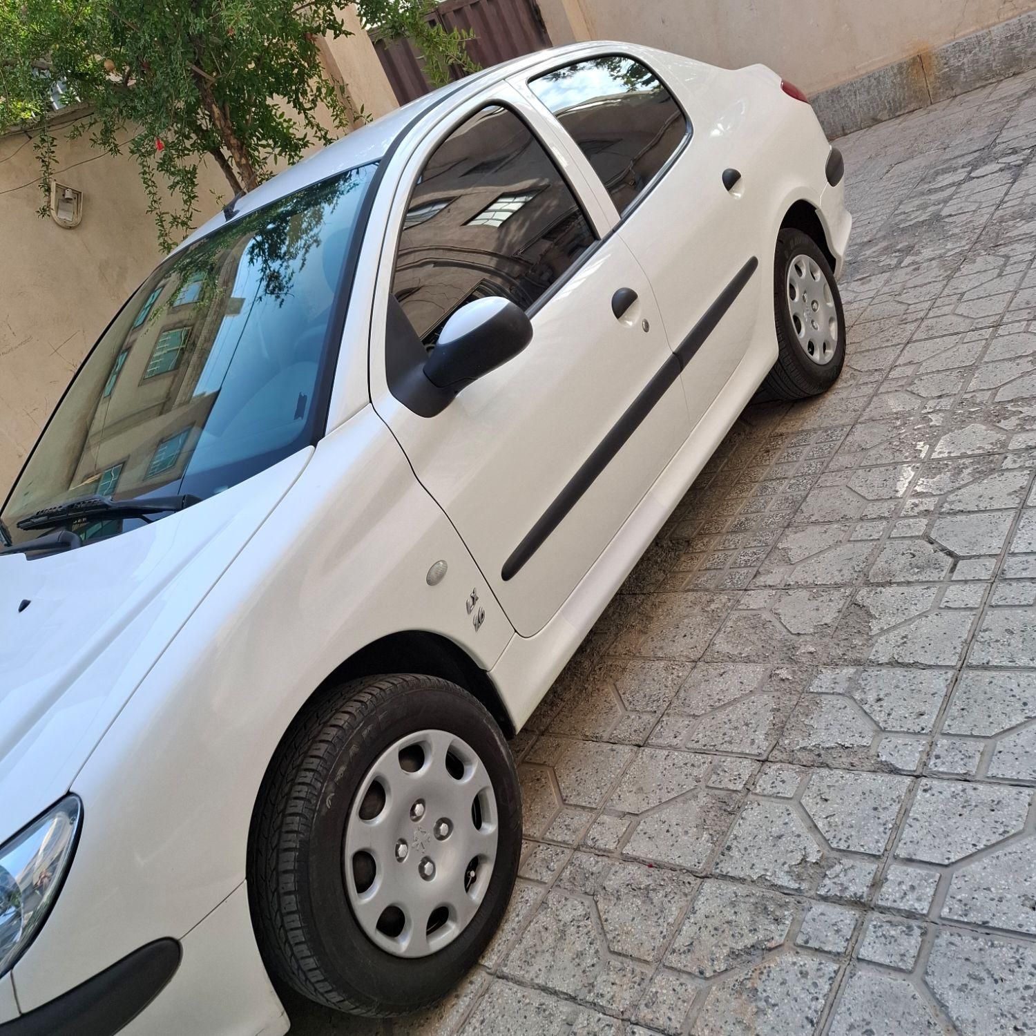 پژو ۲۰۶ صندوق دار v8 - 1398