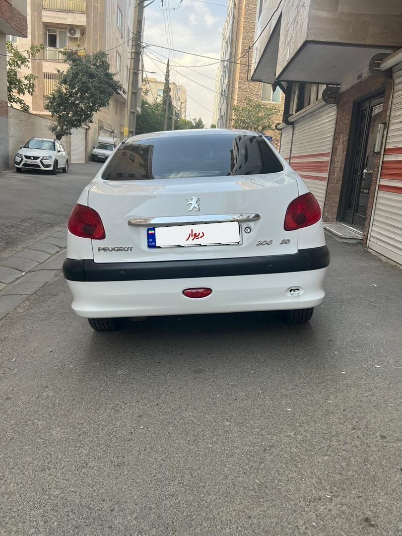 پژو ۲۰۶ صندوق دار v8 - 1396