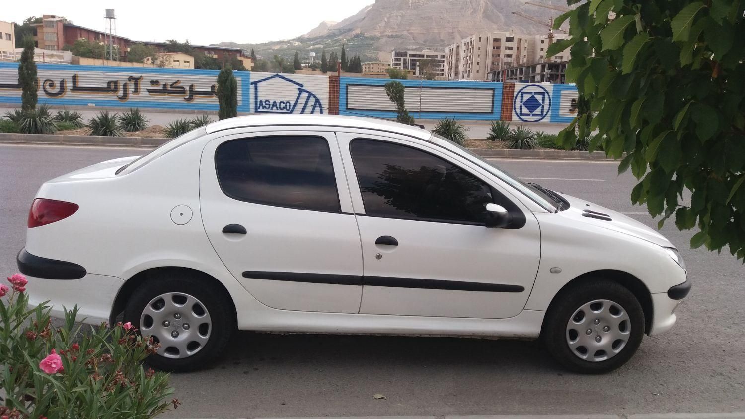 پژو ۲۰۶ صندوق دار v8 - 1391