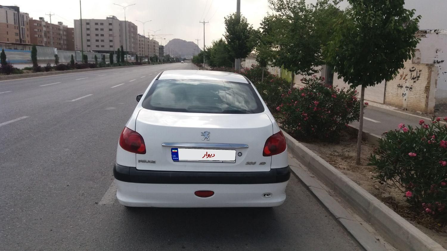پژو ۲۰۶ صندوق دار v8 - 1391
