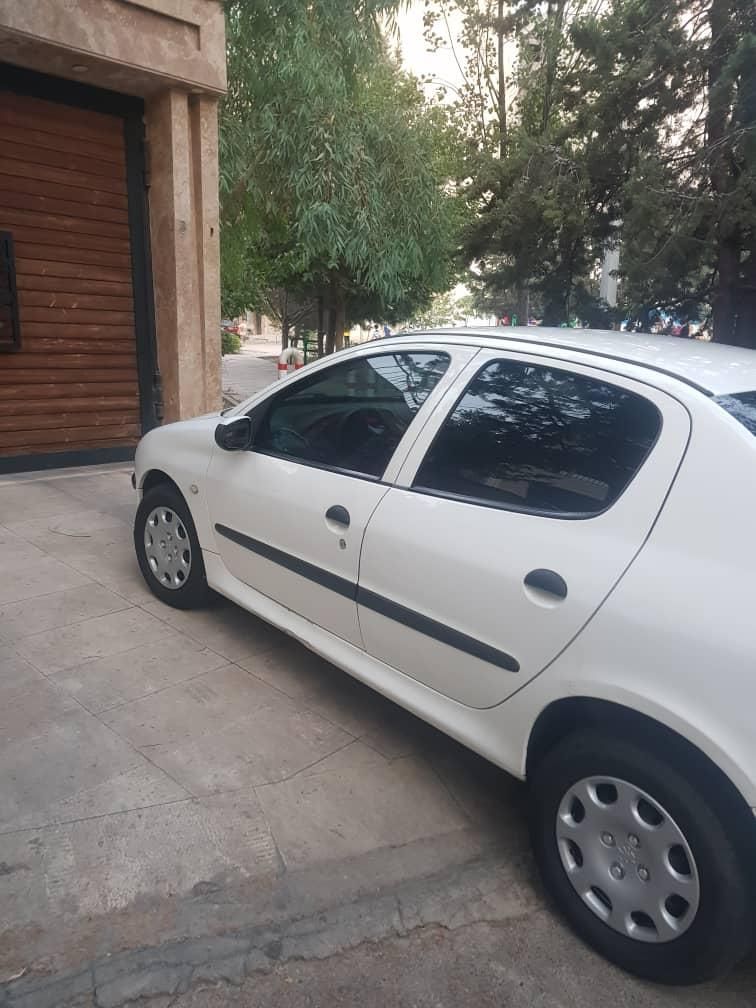 پژو ۲۰۶ صندوق دار v8 - 1394