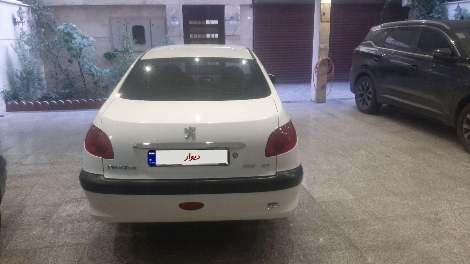 پژو ۲۰۶ صندوق دار v8 - 1396