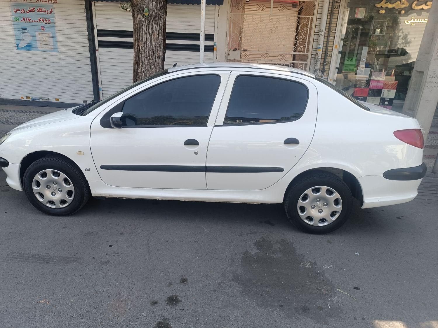 پژو ۲۰۶ صندوق دار v8 - 1390
