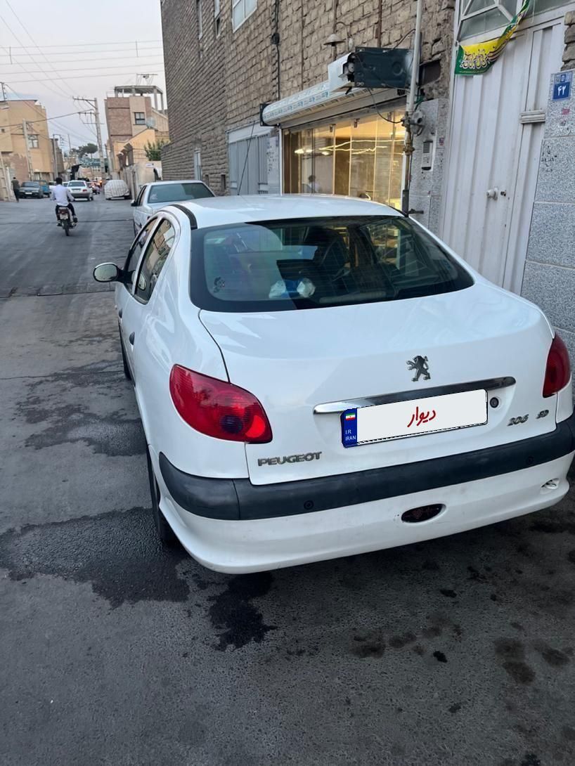پژو ۲۰۶ صندوق دار v8 - 1394
