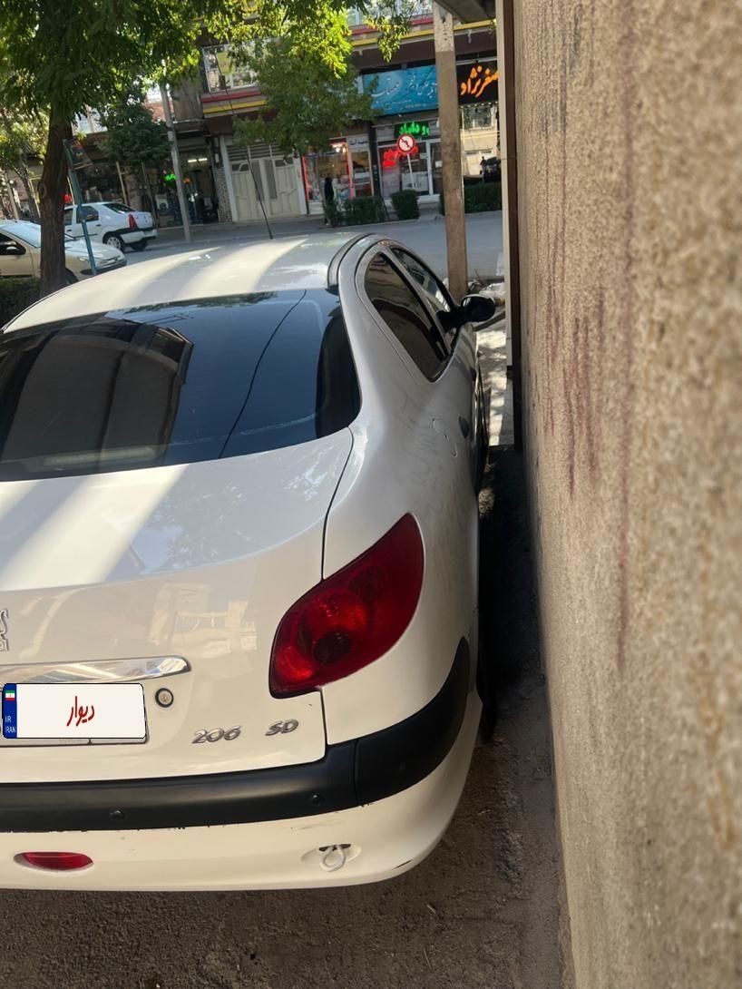 پژو ۲۰۶ صندوق دار v8 - 1398