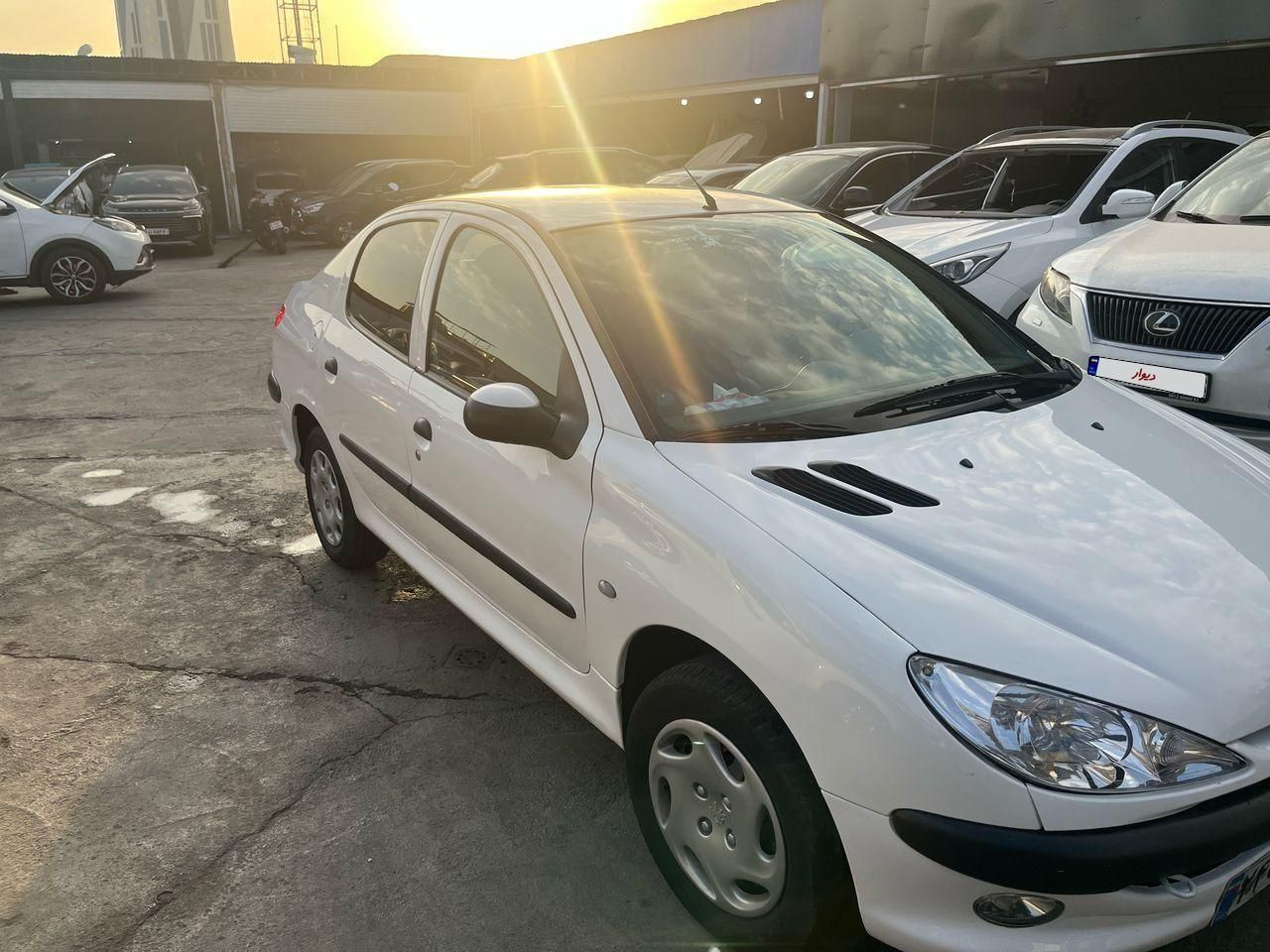 پژو ۲۰۶ صندوق دار v8 - 1399