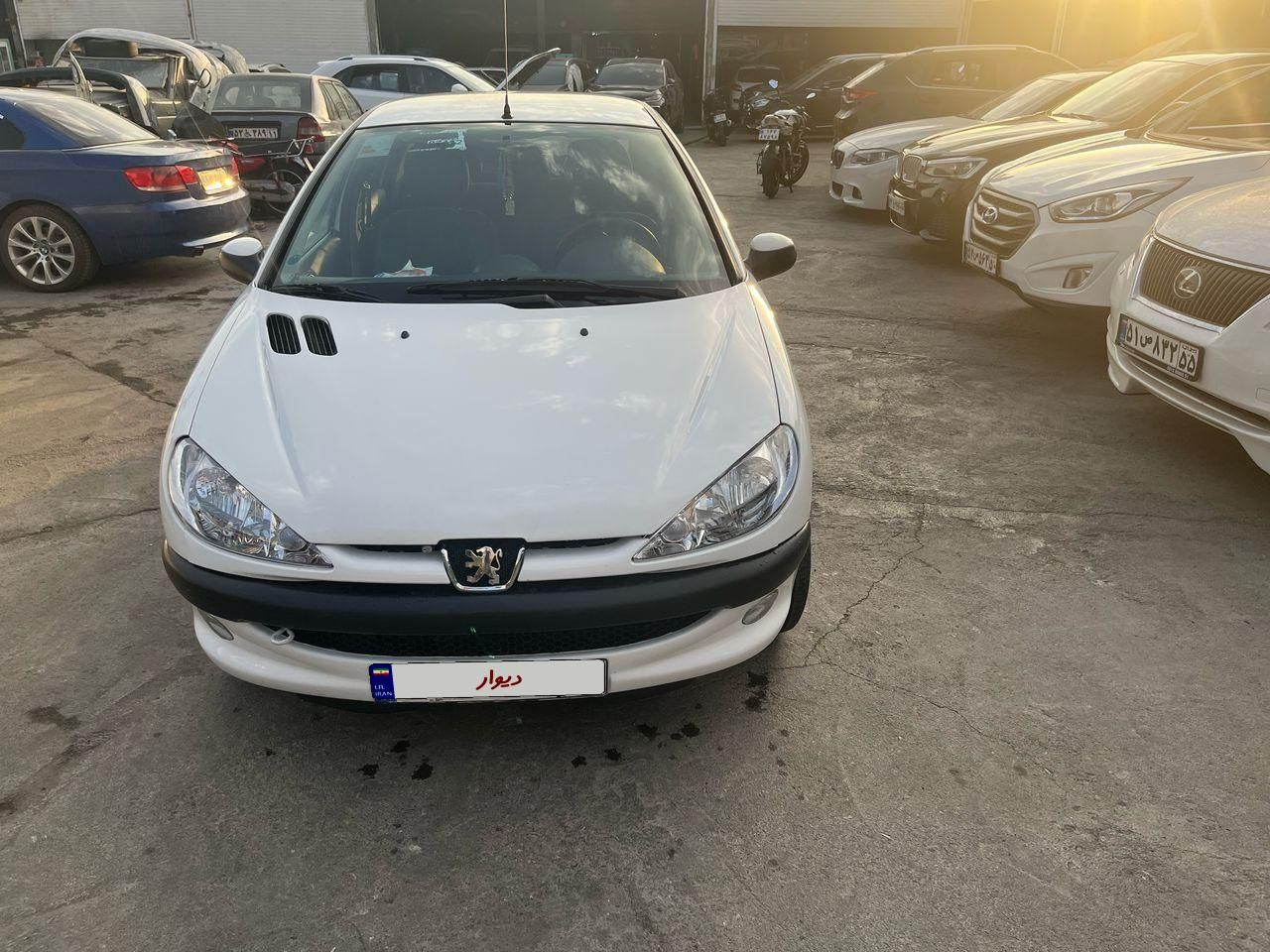 پژو ۲۰۶ صندوق دار v8 - 1399