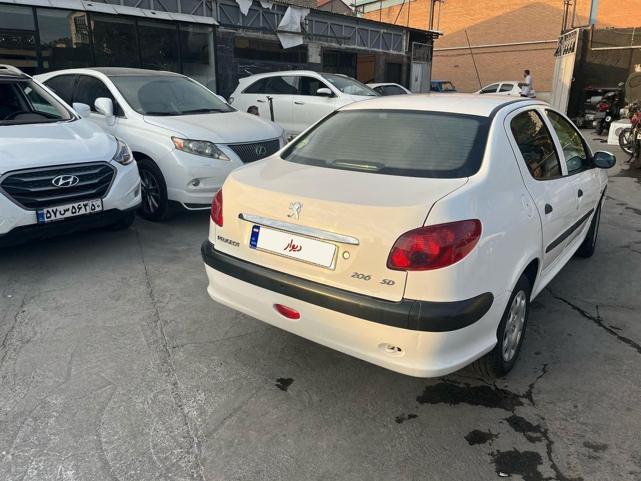 پژو ۲۰۶ صندوق دار v8 - 1399
