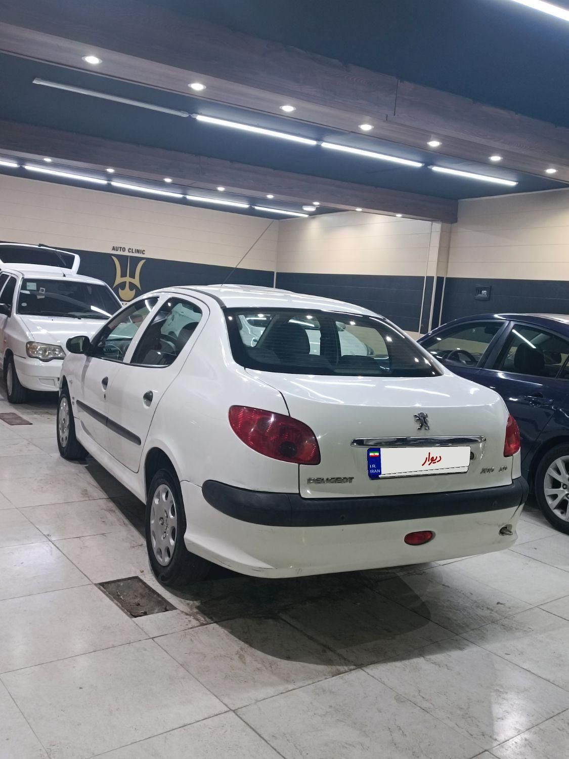 پژو ۲۰۶ صندوق دار v8 - 1396